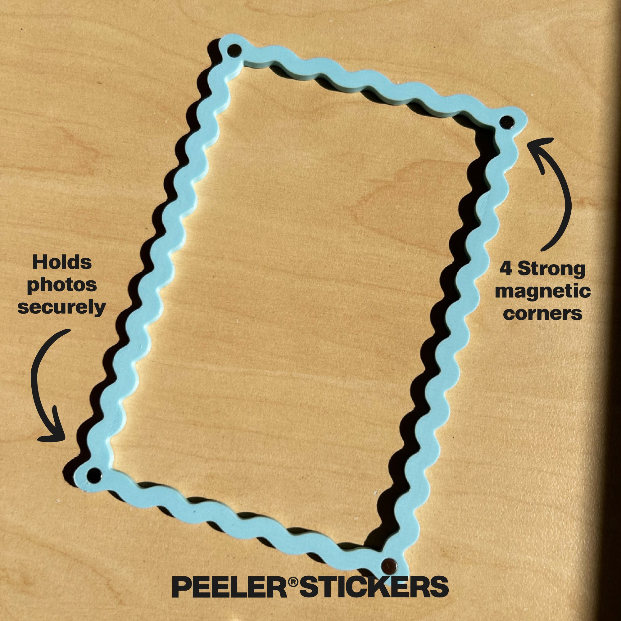 Magnetic photo frame with text on a wooden background