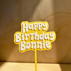 Personalised Happy Birthday cake topper in yellow
