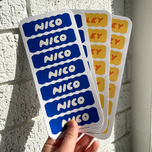 Photo of hand holding Personalised Kids Name Labels 