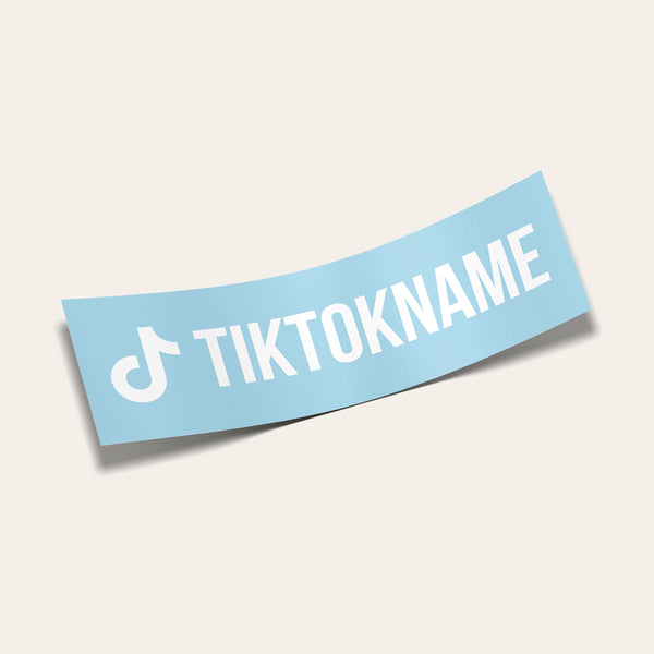 Sticker with the white TikTok logo and the text 'TIKTOKNAME' on a warm off-white background.
