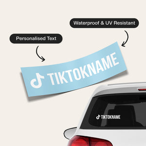 A light blue car window decal with white TikTok logo and customizable text 'TIKTOKNAME' shown floating above a car rear window, with callout labels reading 'Personalised Text', 'Waterproof & UV Resistant', and a small 'TIKTOKNAME' example on the window.