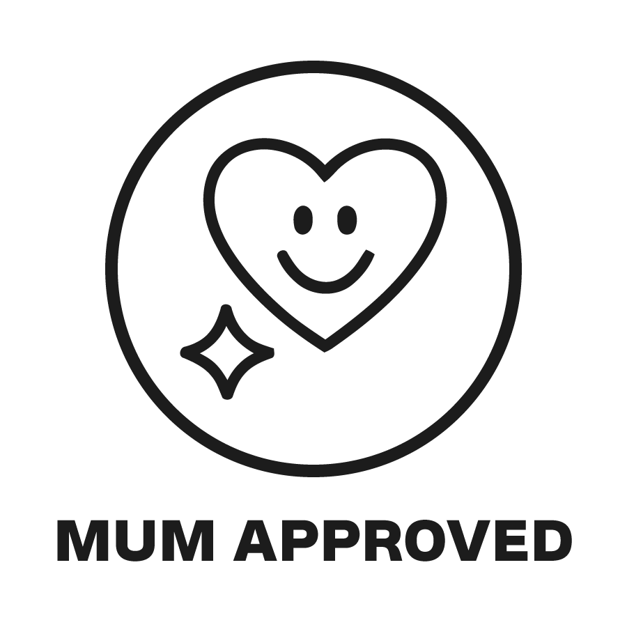 Black and white icon with a heart and smiley face, surrounded by text 'Mum Approved' on a white background.